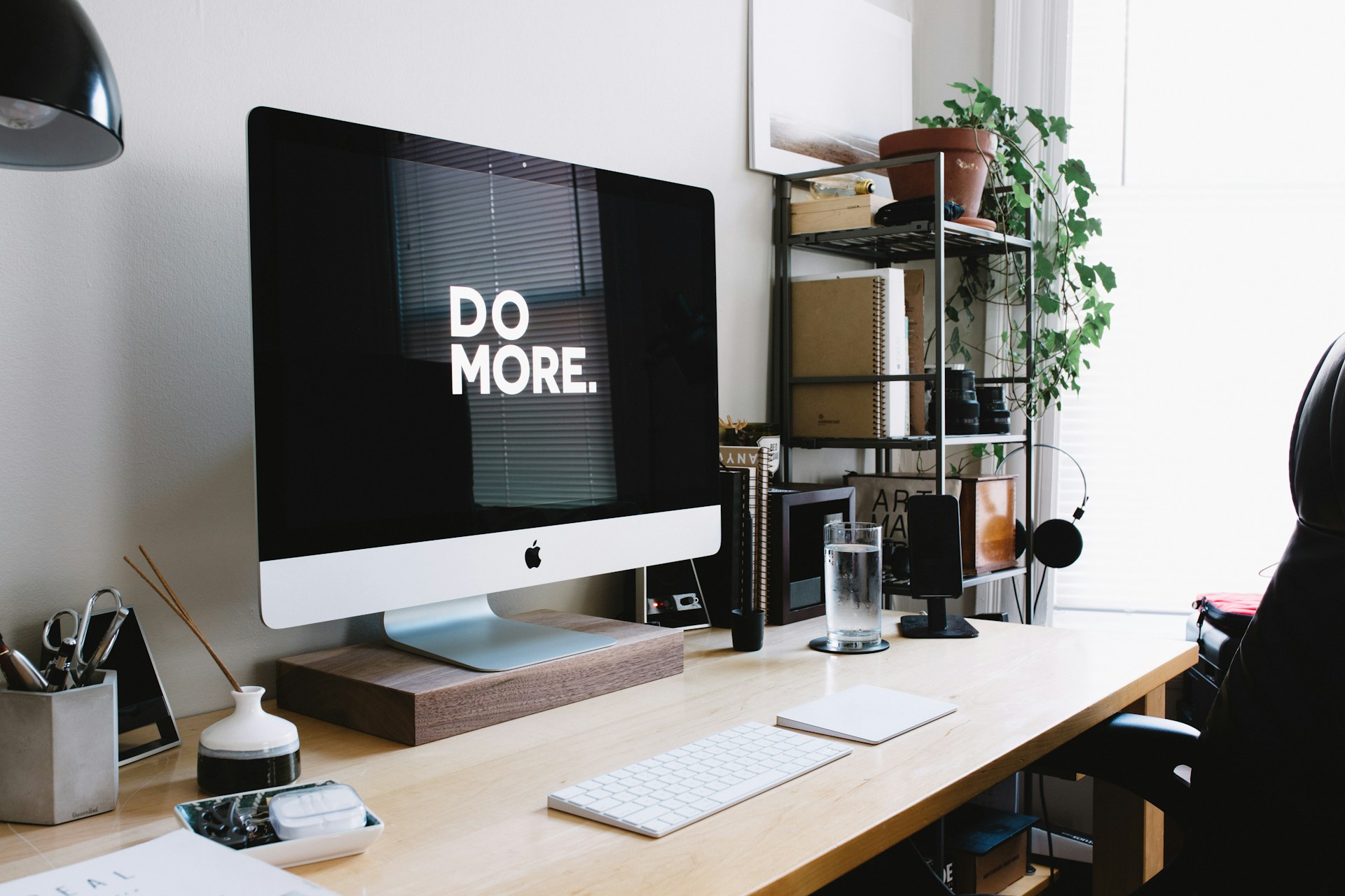 Unsplash image by Carl Heyerdahl of a computer setup whose monitor says "Do More".