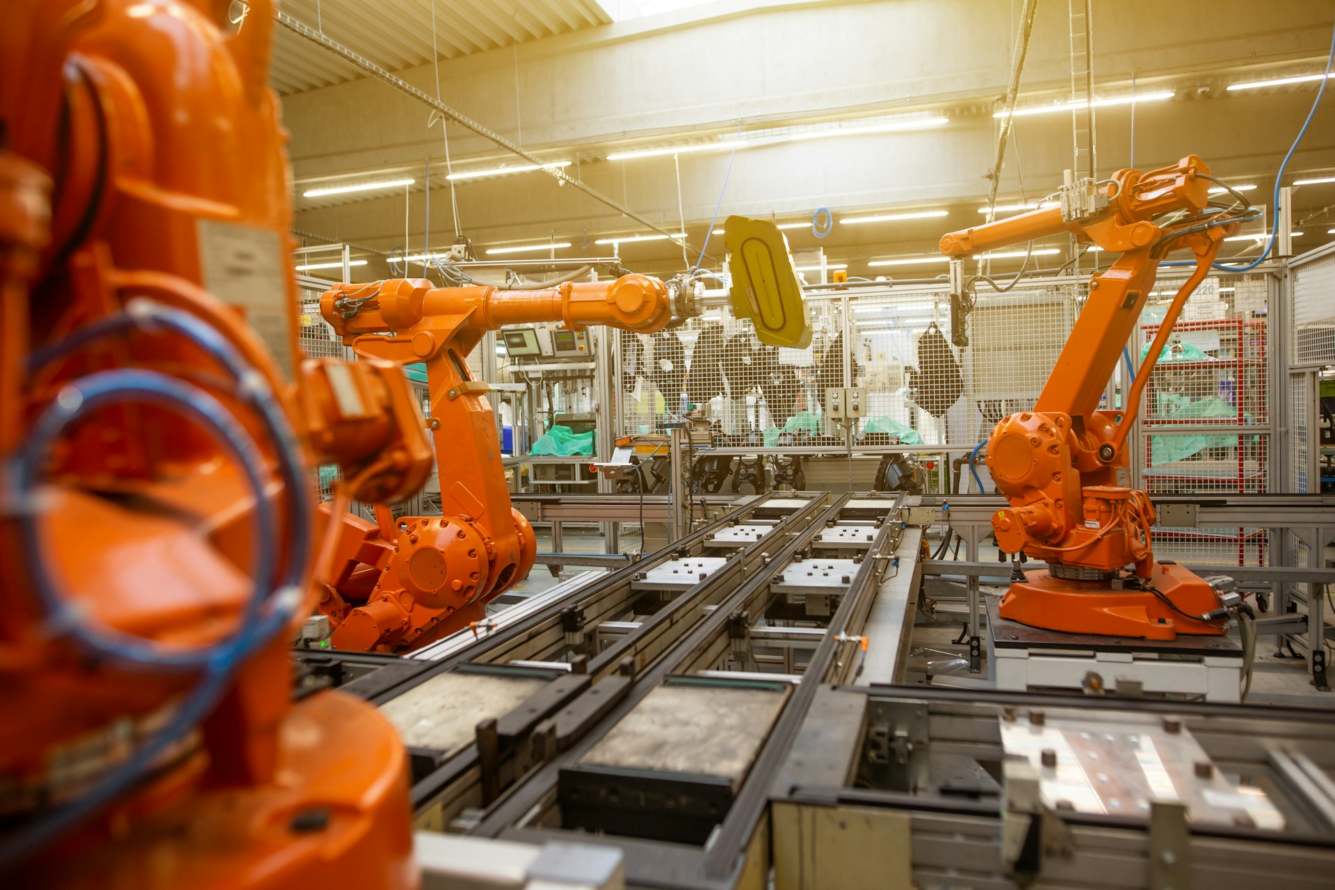 Automatic robots in the industrial factory for assembly automotive products, automotive concept, an analogy of automated protein synthesis