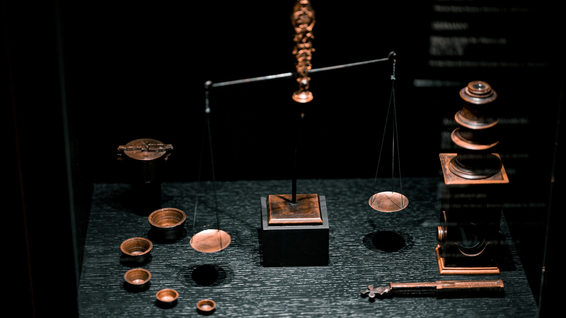 A weighing balance resting on a table